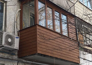 отделка сайдингом в цвет остекления